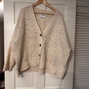 Oversized chunky knit cream sweater.